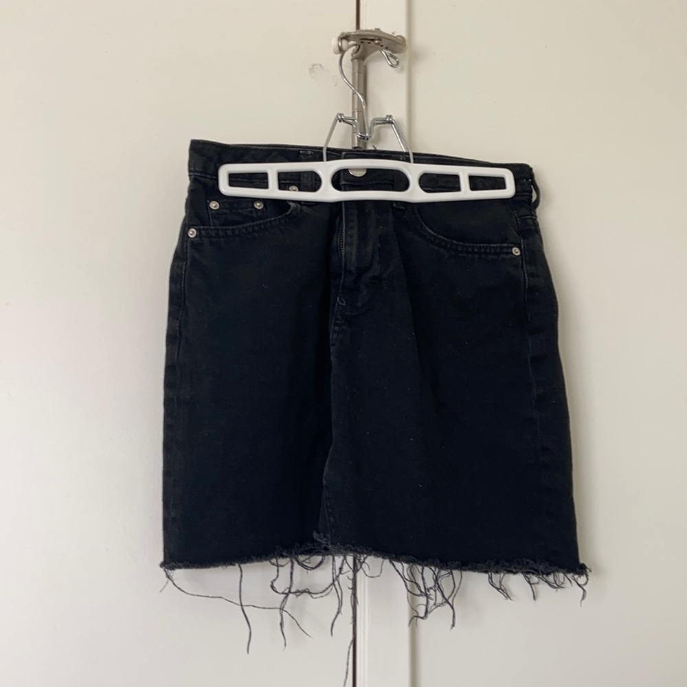 Black denim mini skirt